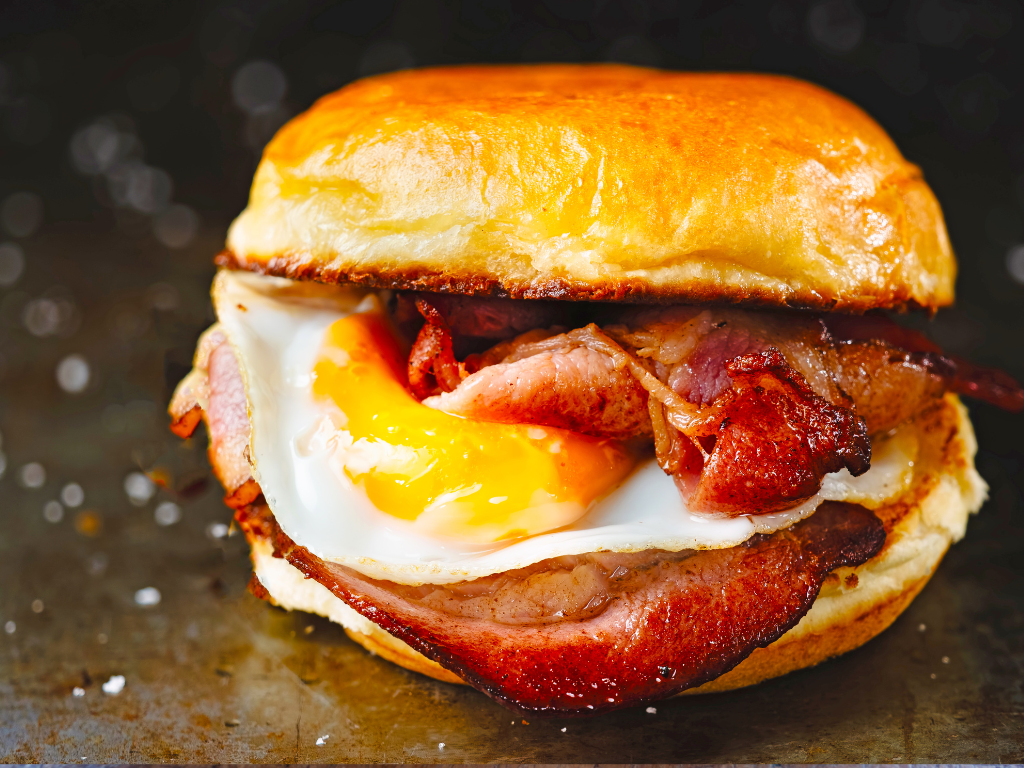 Savor the perfect bacon and egg breakfast sandwich—ideal for learning the art of brunch in hands-on cooking classes near Mokena, Crest Hill, and Chicago