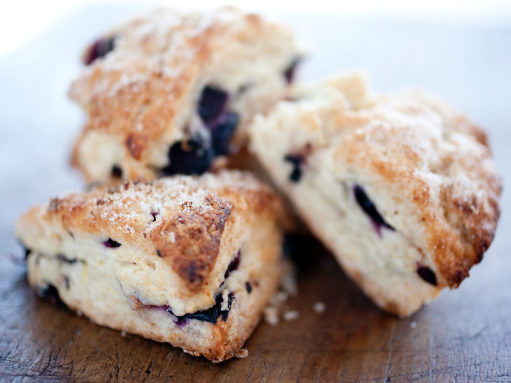 Flaky, golden-brown blueberry scones fresh from the oven—perfect for baking class participants in Mokena, Crest Hill, and Chicago looking to master classic pastries