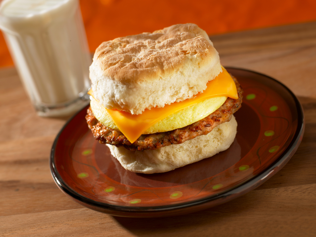 Fluffy biscuit breakfast sandwich with sausage, egg, and cheese — perfect for Breakfast Basics cooking class in Chicago, Crest Hill, or Mokena