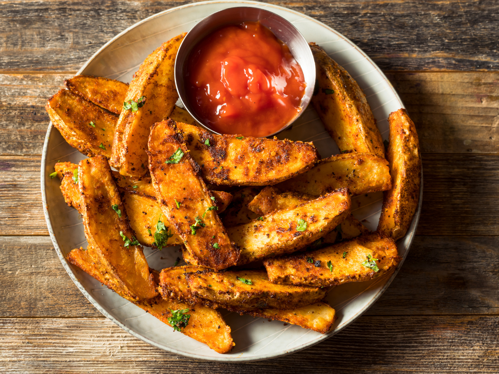 Golden, crispy potato wedges seasoned to perfection and served with tangy ketchup. Master this crowd-pleaser at a hands-on cooking class in Crest Hill, Mokena, or Chicago, Illinois